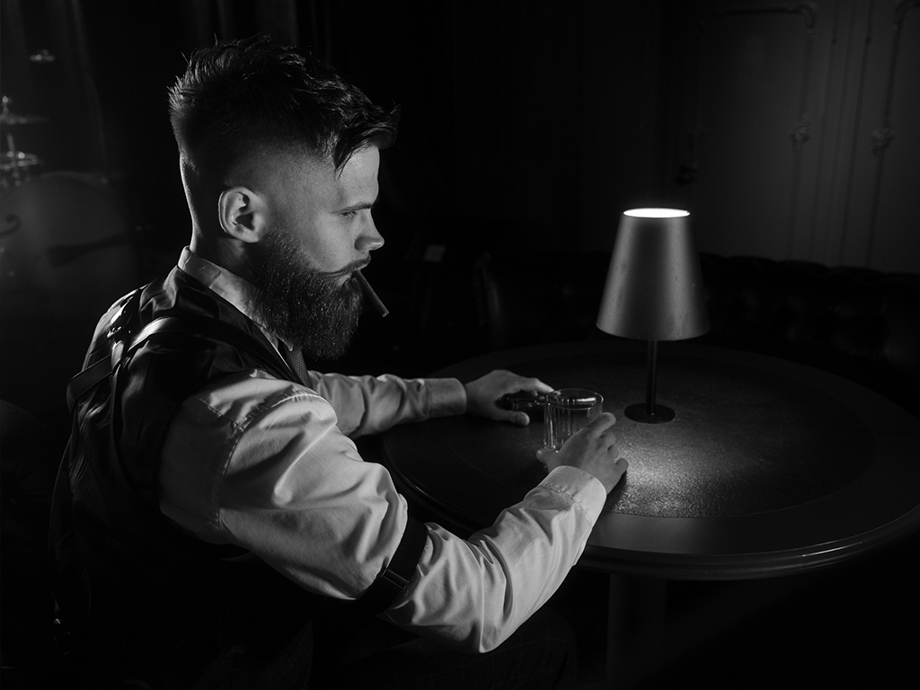 a cinematic picture of a man in vintage clothes